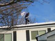 Ken Shoveling Roof